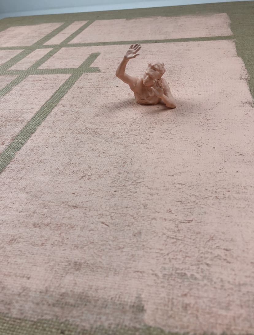 Detail of Lines of Life by Federico Clapis: a pink nylon powder figure half sunk into the painted canvas, raising one hand