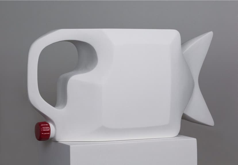 Tank Fish by Federico Clapis: white sculpture of a plastic jerrycan with a fish tail and a red cap, on a white plinth