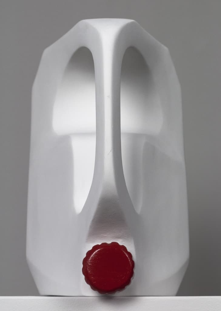 Tank Fish by Federico Clapis, front view: white jerrycan-shaped sculpture with its handle and red screw cap on a grey background