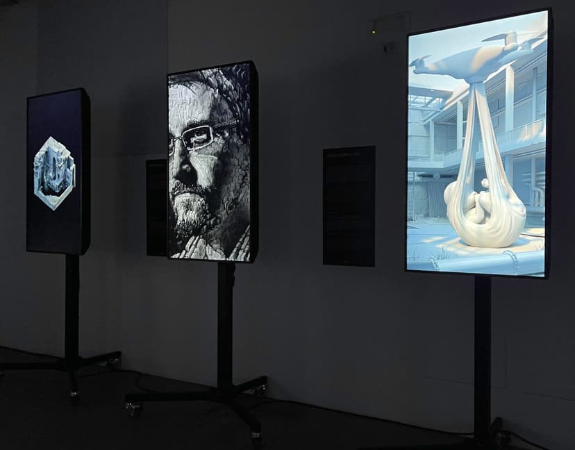 Three screens at the Art Evolution exhibition, DART Milan: a geometric form, a portrait and Federico Clapis' white render of a drone lifting a baby
