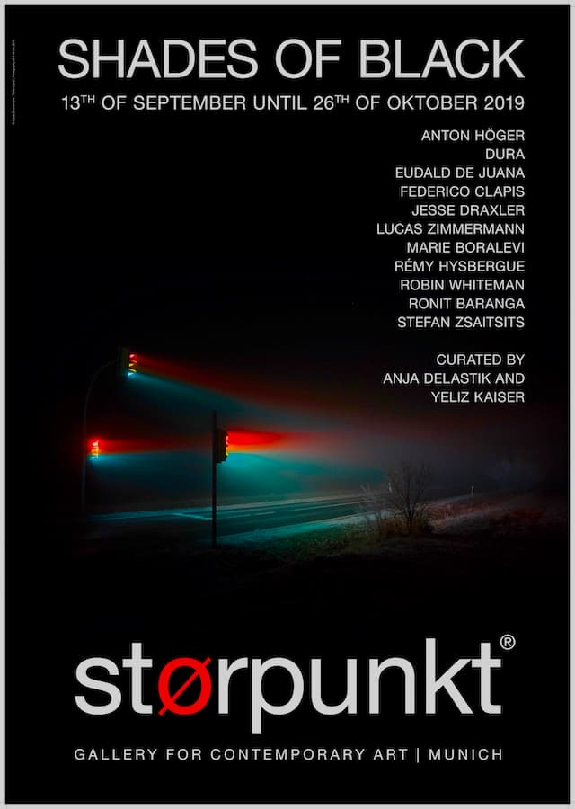 Poster of Shades of Black at størpunkt gallery in Munich, listing Federico Clapis among the artists, over a photo of traffic lights in fog